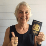Picture of client with new British Passport in hand