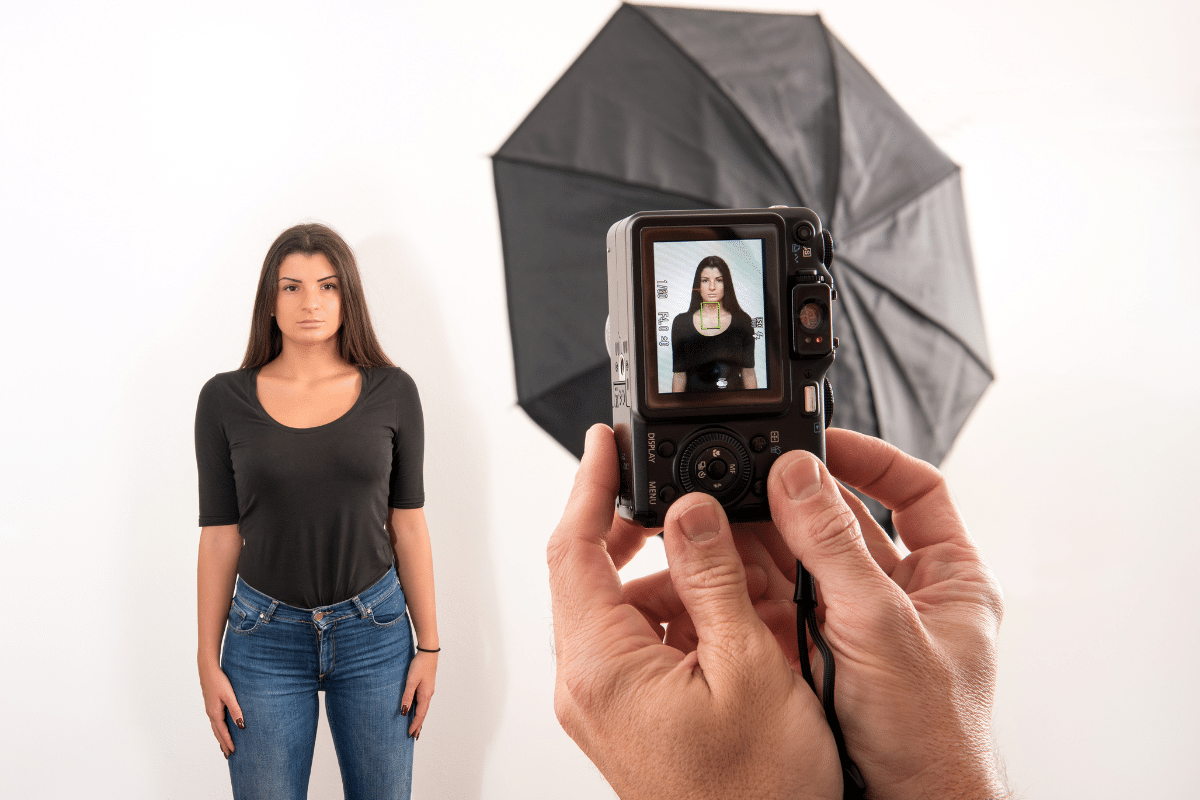 woman taking passport photo